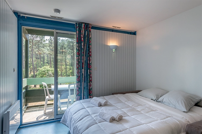 Chambre d'un appartement de la Résidence Les Cavales